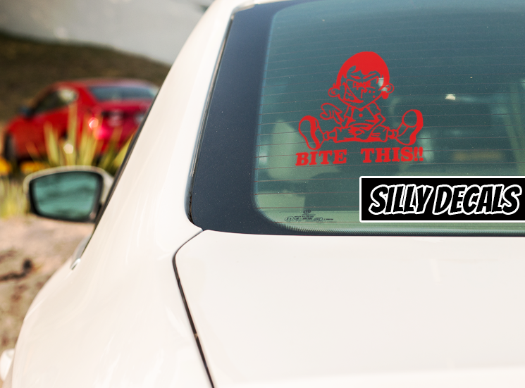 Bite This; Funny Adult Vinyl Decals Suitable For Cars, Windows, Walls, and More!