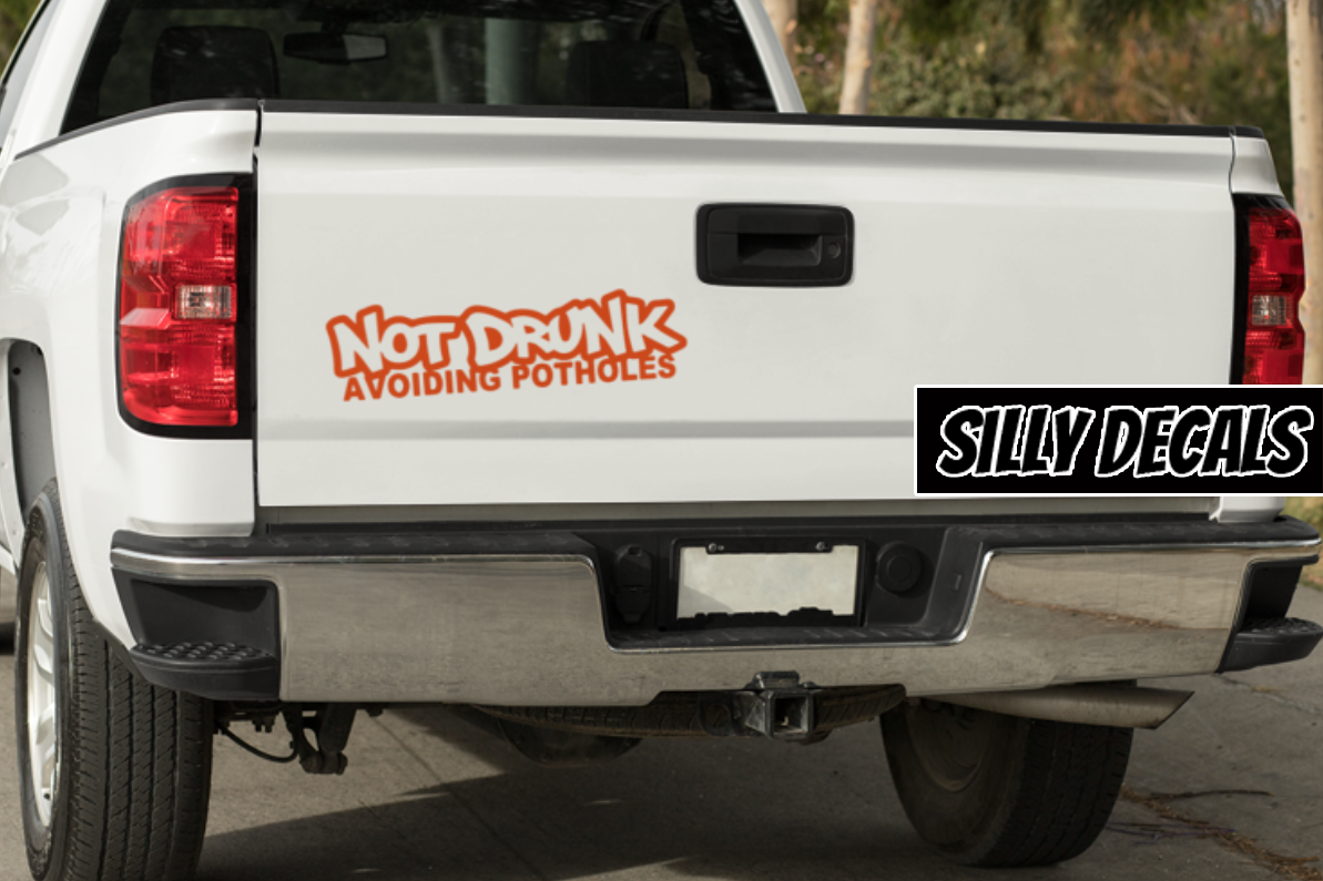 Not Drunk, Avoiding Potholes; Funny Adult Vinyl Decals Suitable For Cars, Windows, Walls, and More!