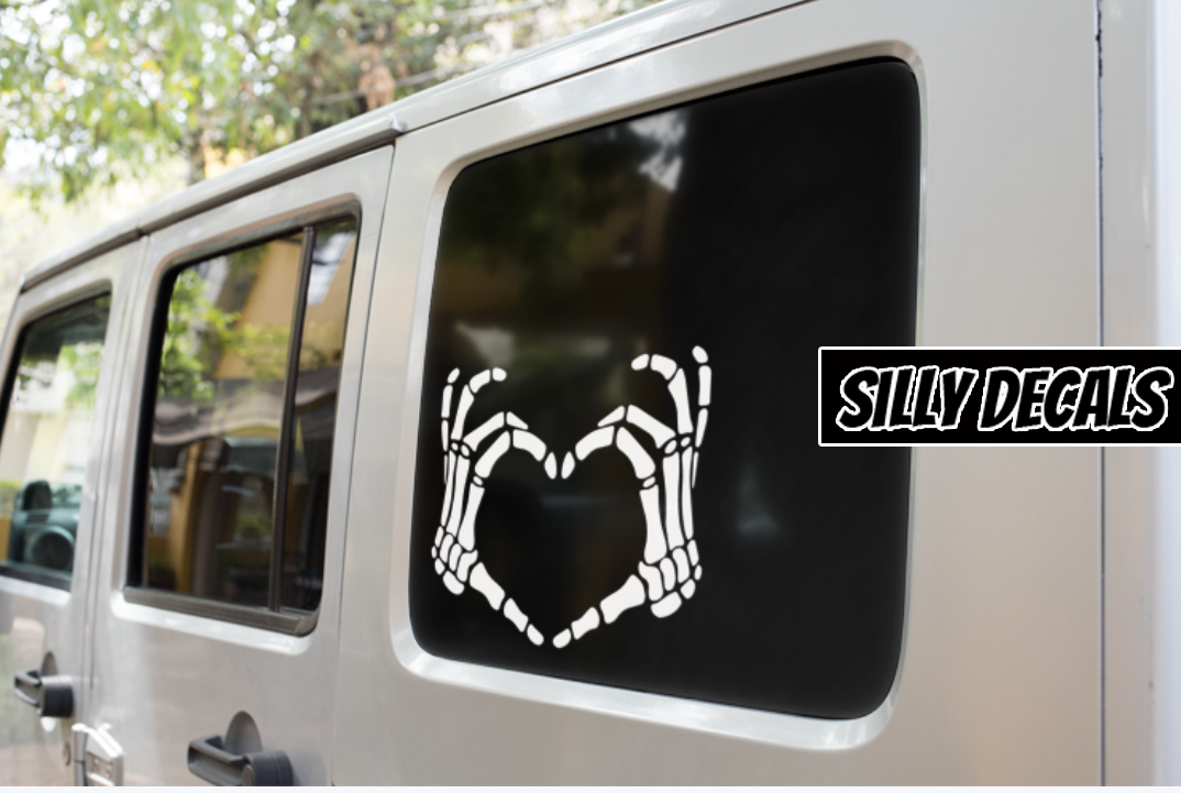 Skeleton Finger Heart; Cute Spooky Halloween Vinyl Decals Suitable For Cars, Windows, Walls, and More!