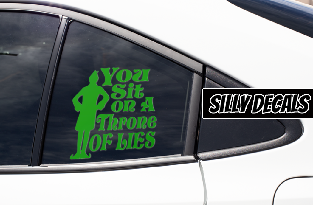 You Sit On a Throne of Lies Elf Inspired; Funny Christmas Elf Inspired Vinyl Decals Suitable For Cars, Windows, Walls, and More!